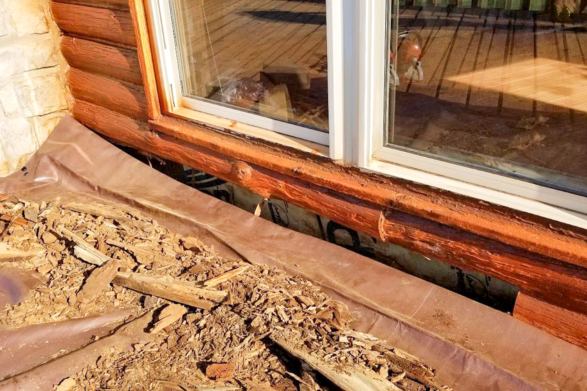 Log Masters Restorations Removing Nailed in Mortar and Wire Chinking with Hammer and Chisel
